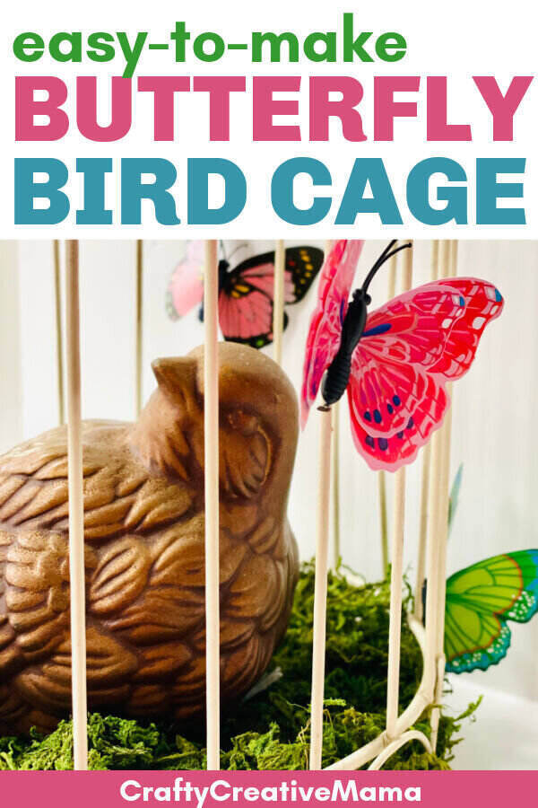 A ceramic bird sitting in a bird cage with colorful butterflies glued to it. 